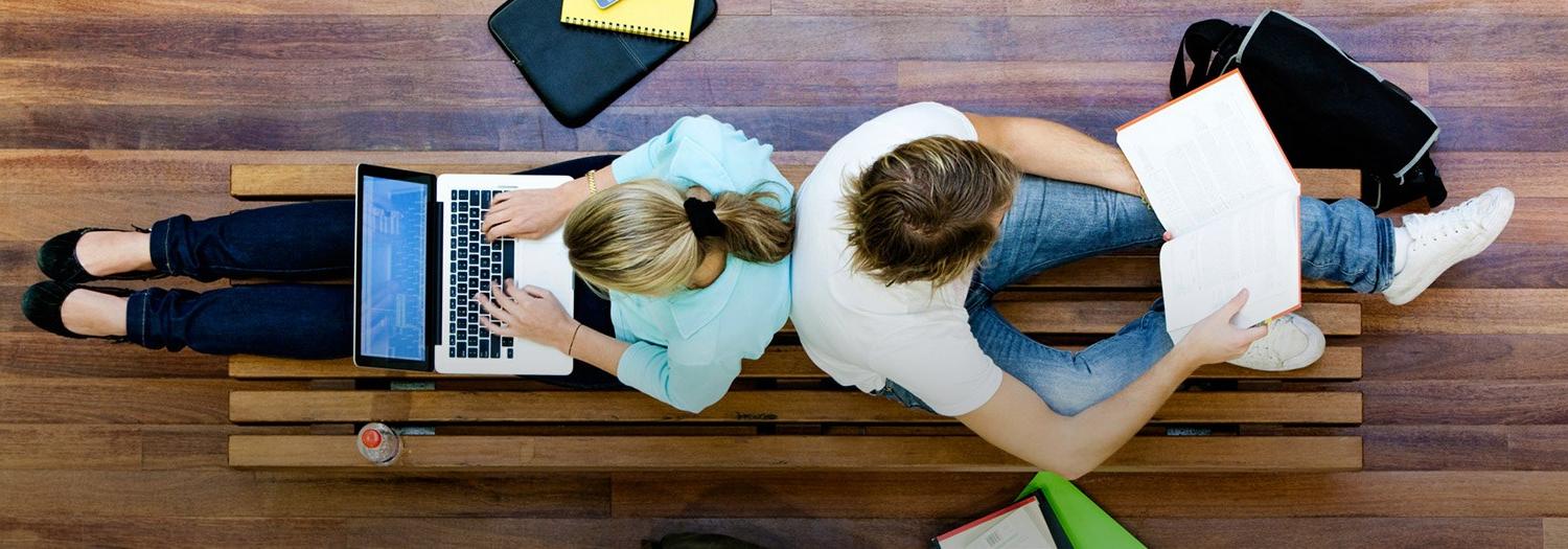 Students seated surfing the web